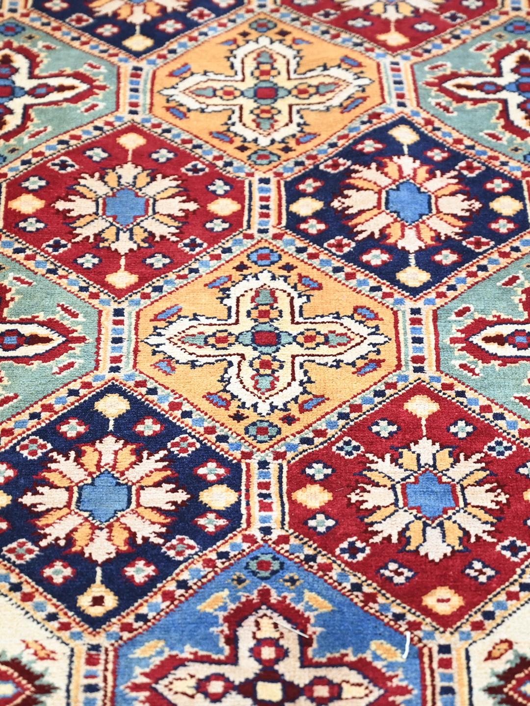 Handmade Afghan rug in multicolour