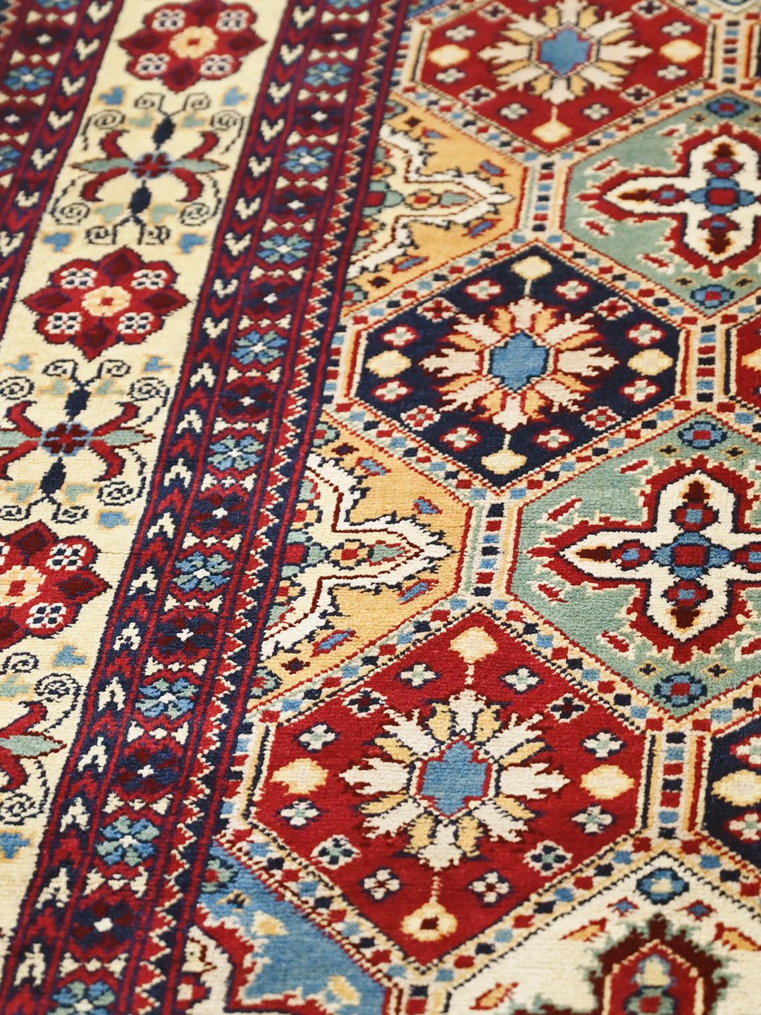 Handmade Afghan rug in multicolour