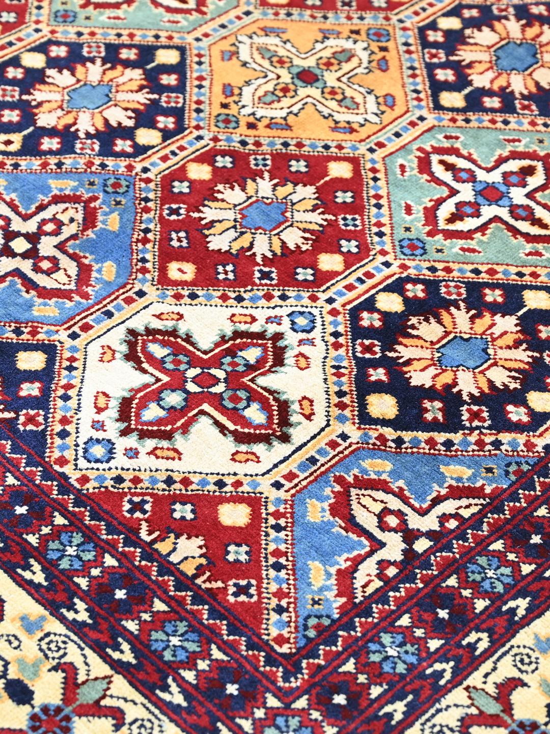 Handmade Afghan rug in multicolour