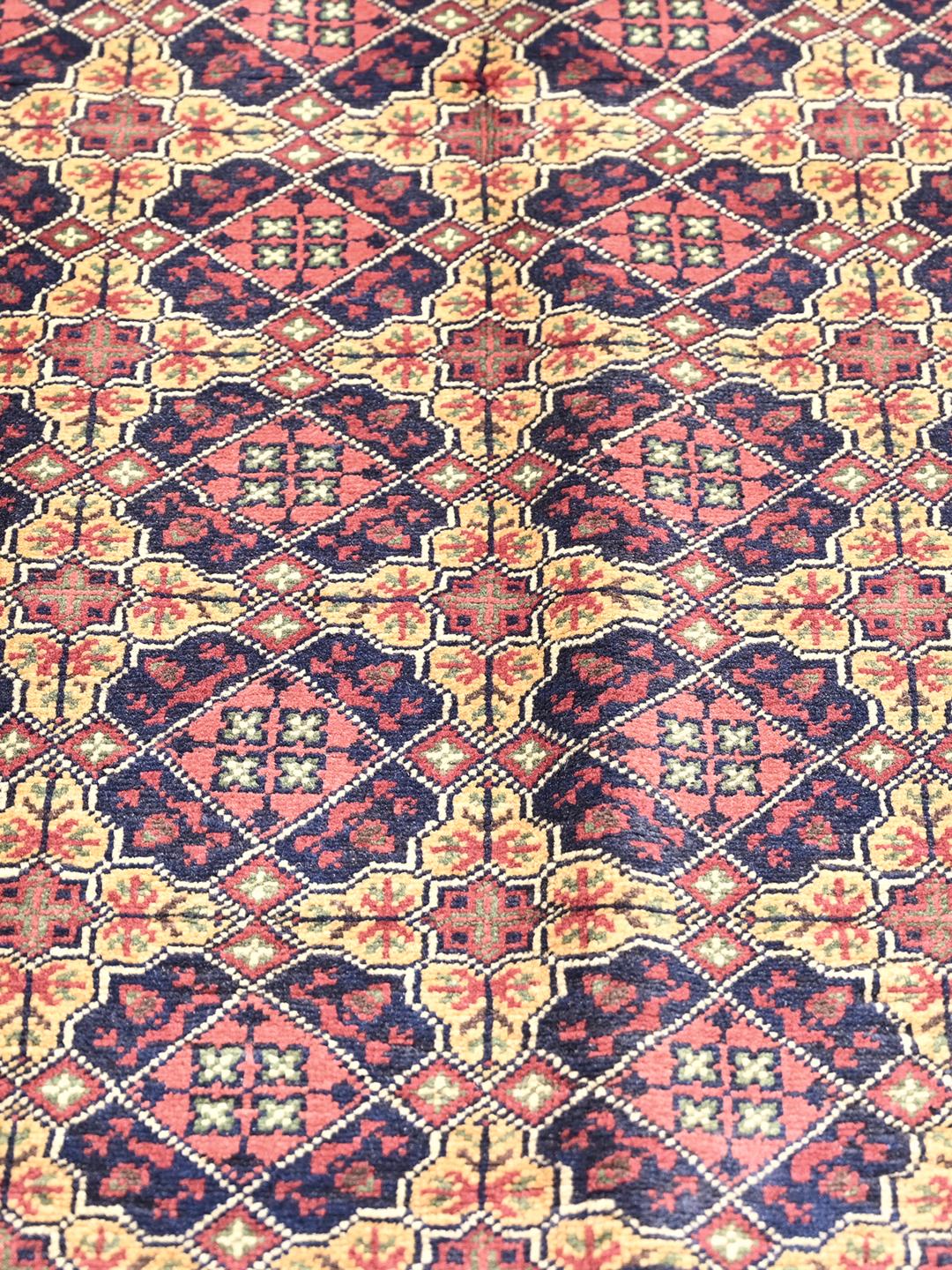 Kunduz rug from Afghanistan in red