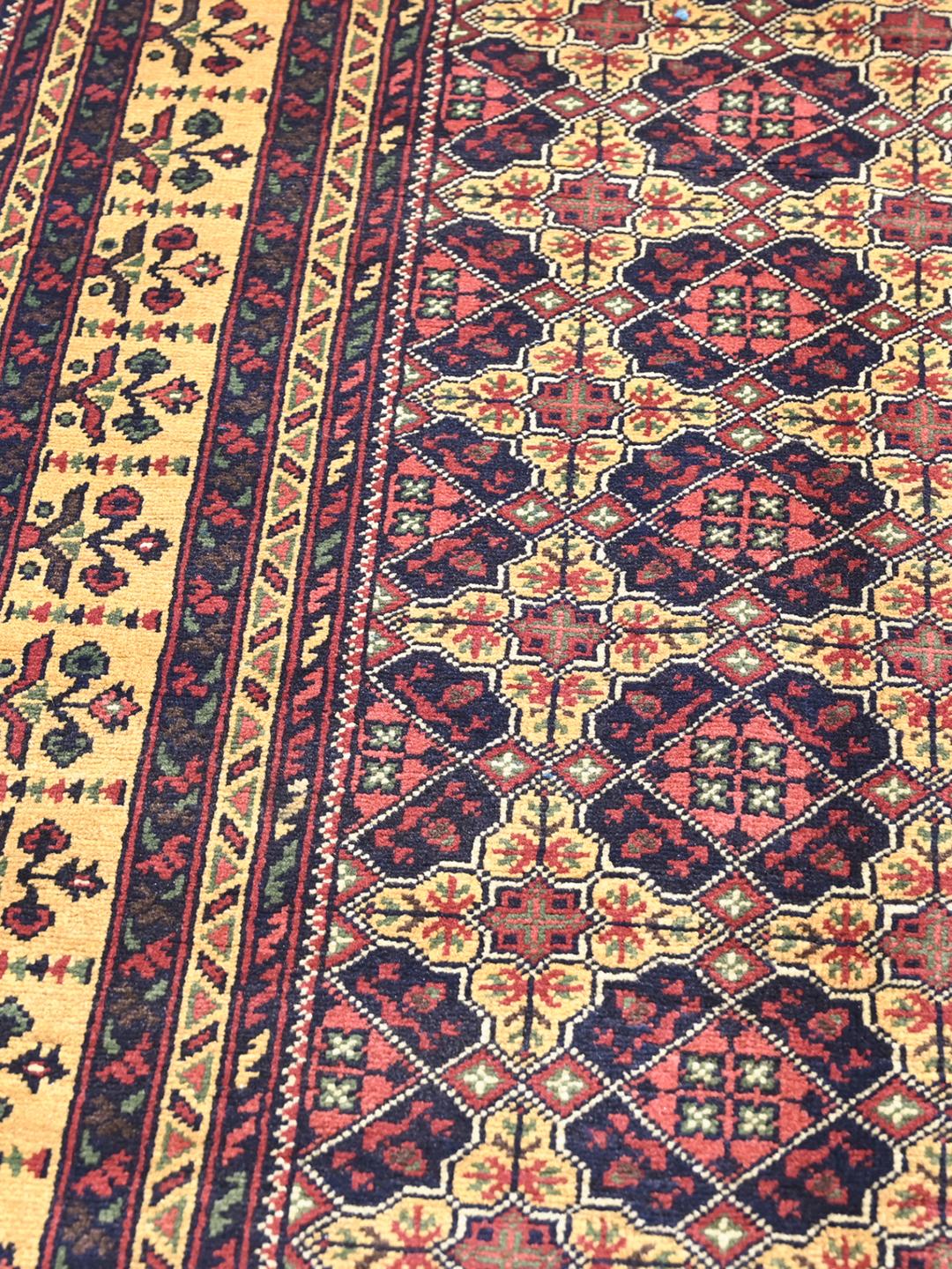 Kunduz rug from Afghanistan in red