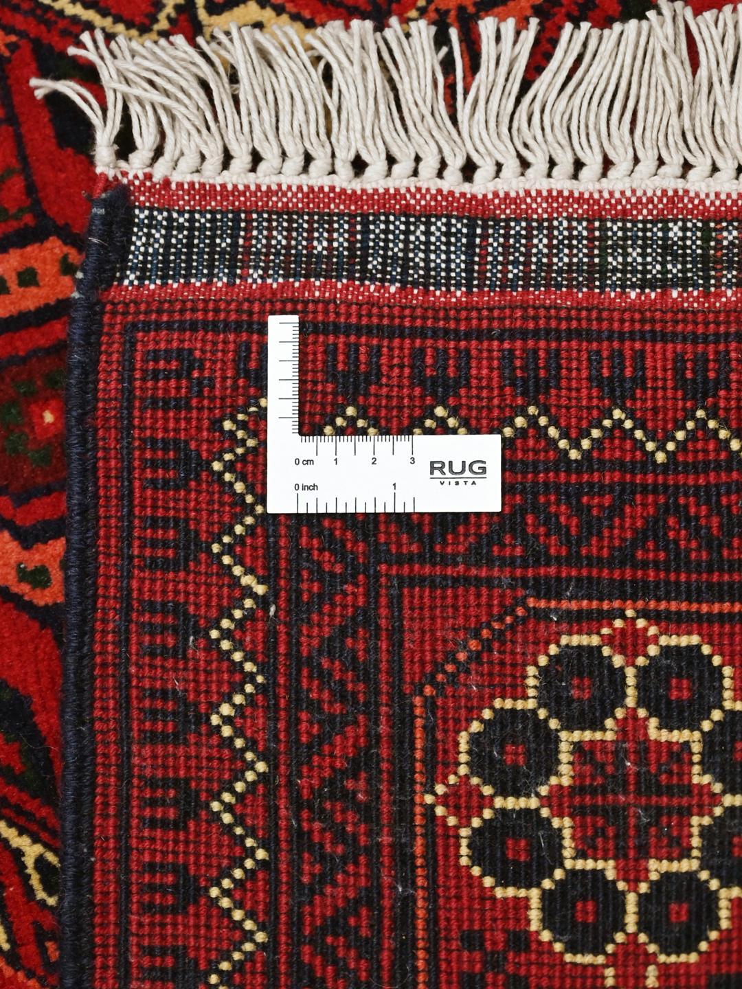 Handgeknoopt rood Afghaans Kunduz vloerkleed met geometrische patronen