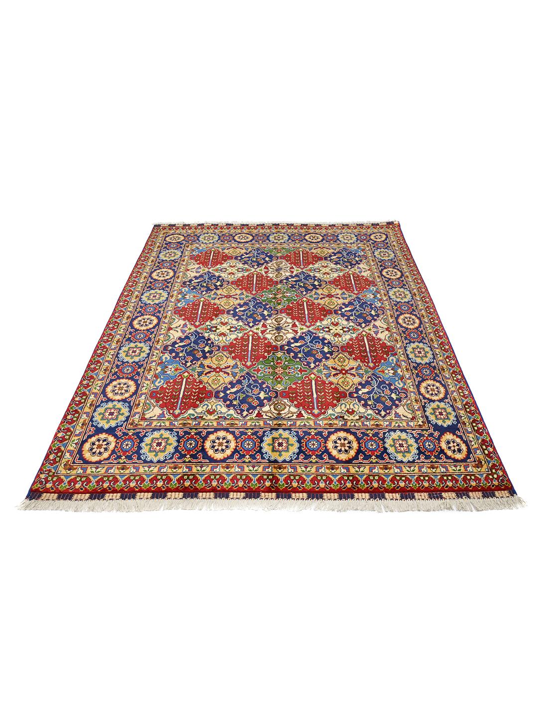Hand-knotted Middle Eastern Kunduz rug with multicolor geometric patterns.