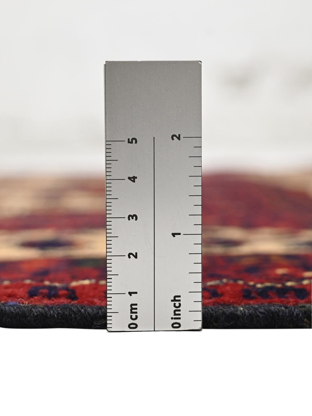 Handmade Afghan Kunduz rug in dark red