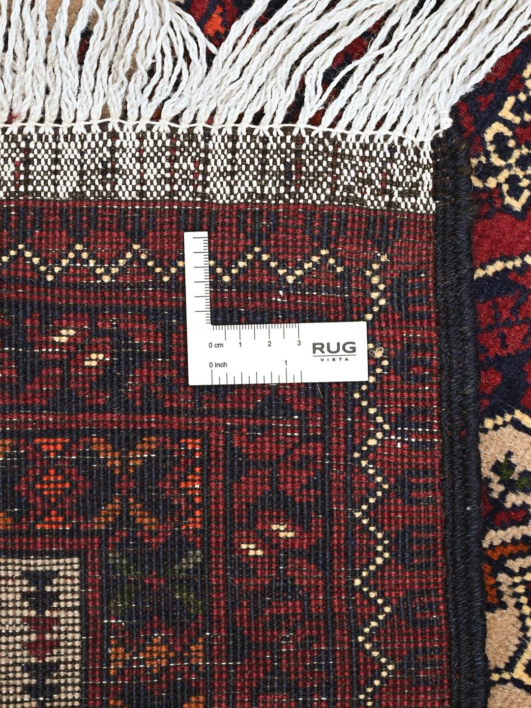 Handmade Afghan Kunduz rug in dark red