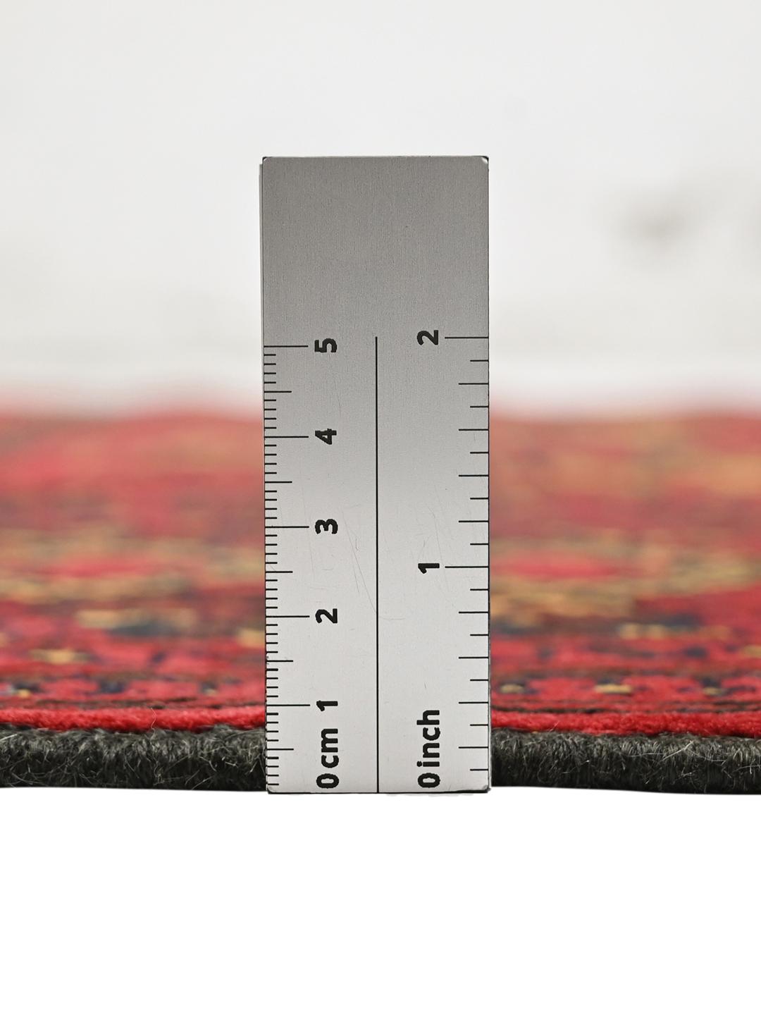 Hand-knotted Middle Eastern Kunduz rug in deep red and black tones