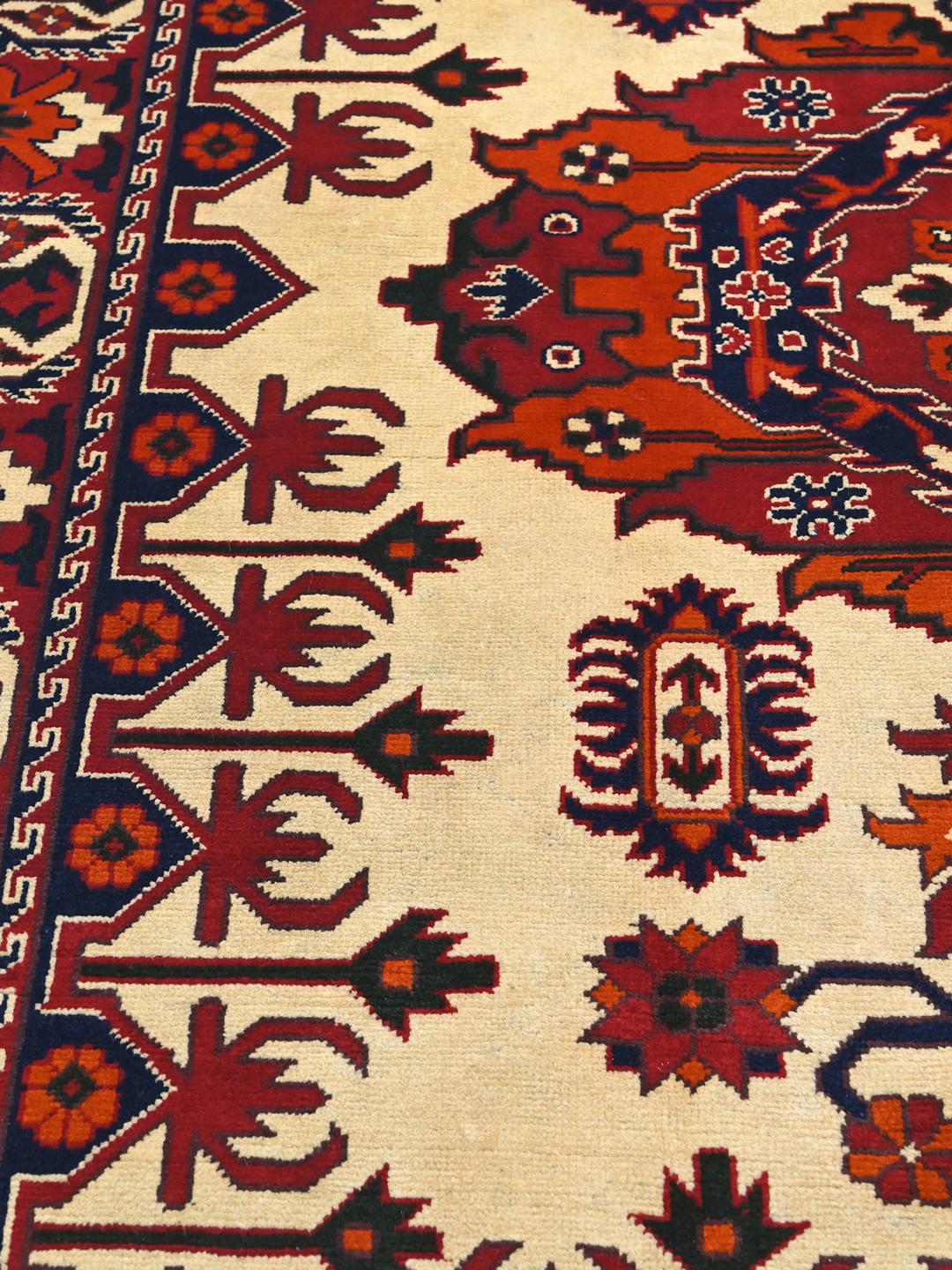 Hand-knotted Kunduz wool rug in beige and dark-red from Afghanistan