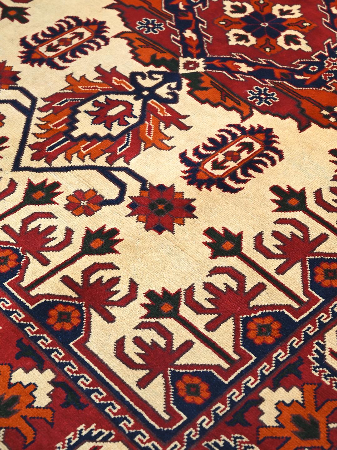 Hand-knotted Kunduz wool rug in beige and dark-red from Afghanistan