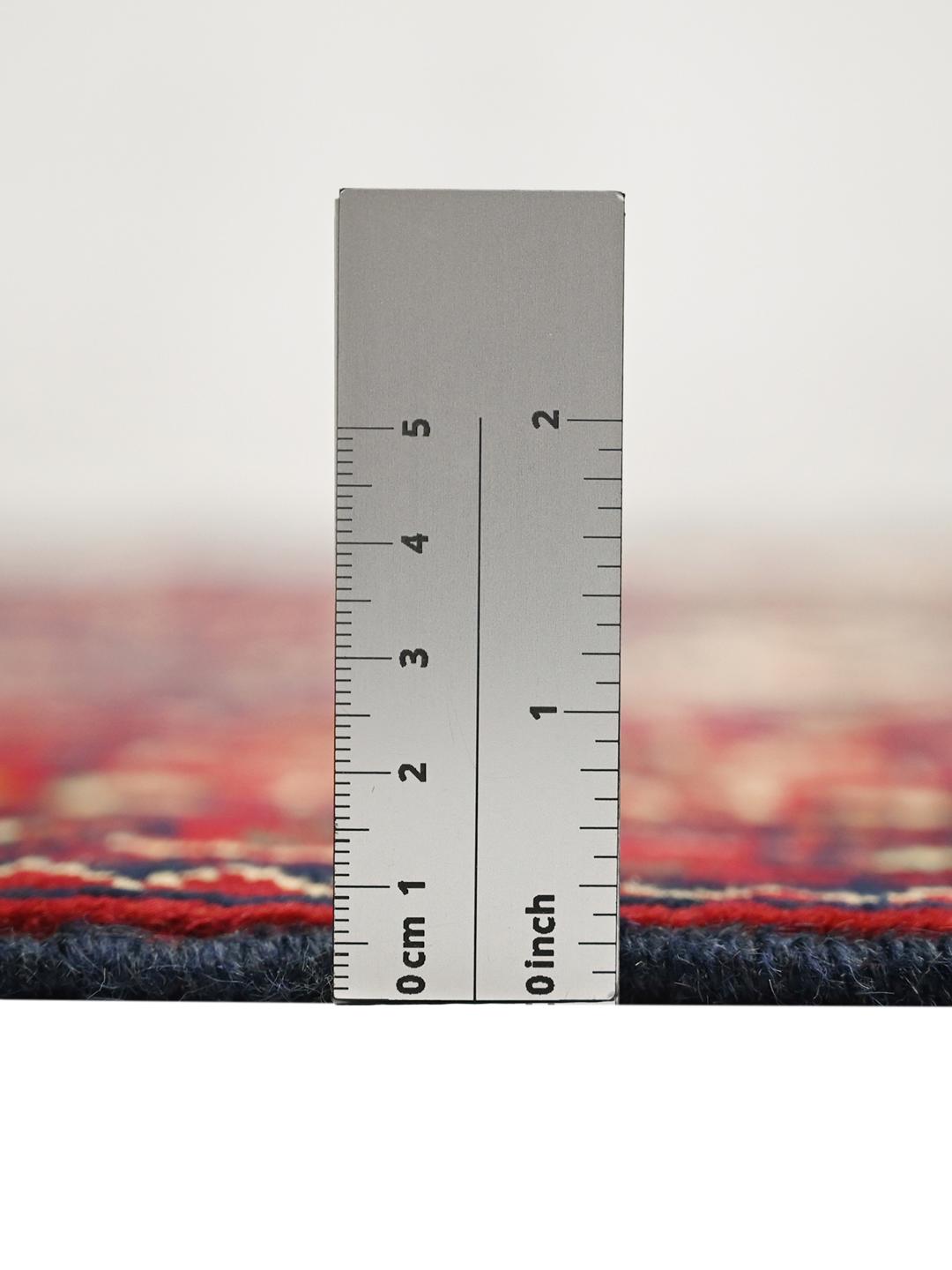 Handmade Afghan Kunduz rug in red and dark blue