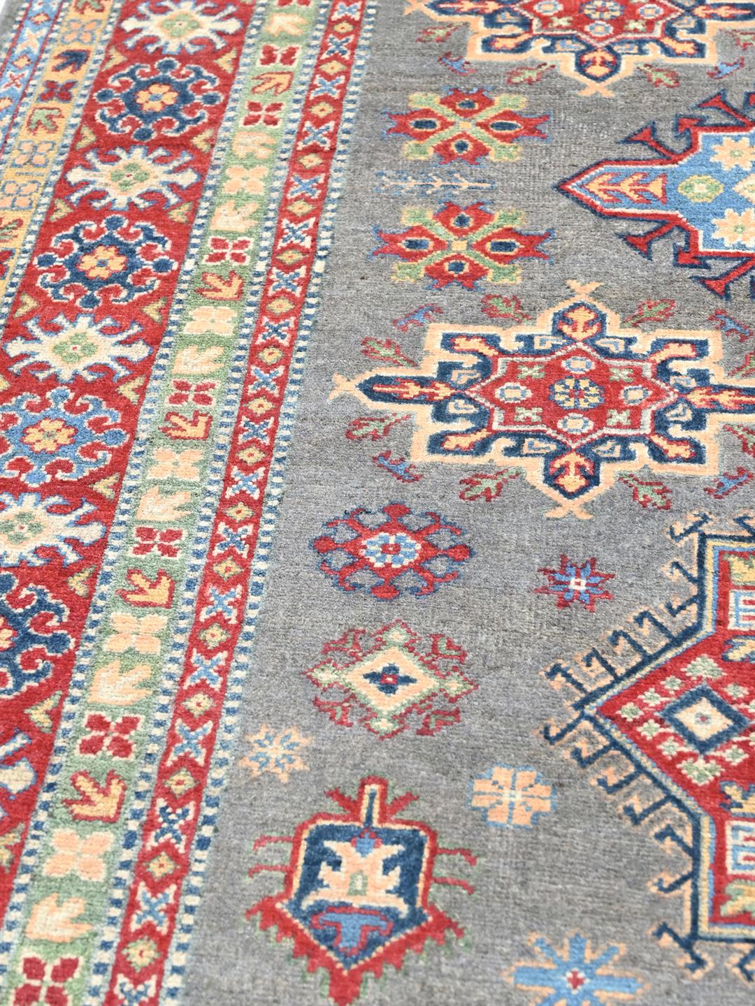 Hand-knotted Kazak Fine wool rug in grey and red from Afghanistan