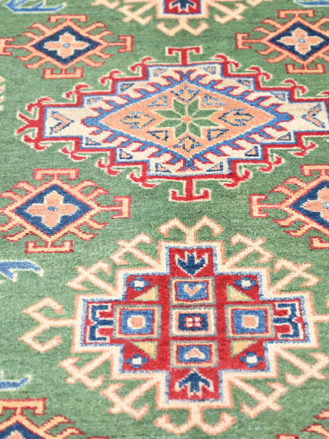 Hand-knotted Kazak Fine rug from Afghanistan in green and multicolor