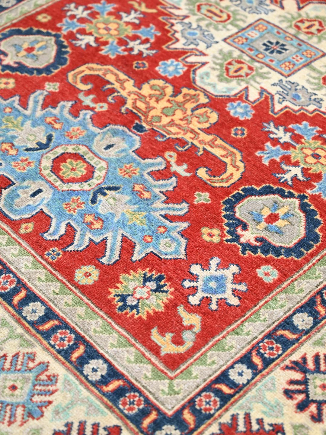 Hand-knotted Kazak Fine wool rug from Afghanistan in red and blue