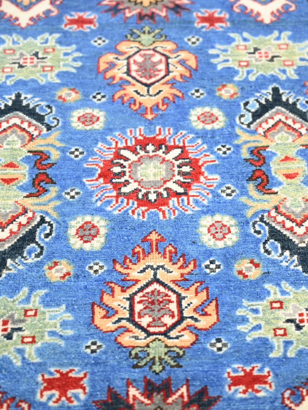 Hand-knotted Kazak Fine wool rug from Afghanistan in blue and red