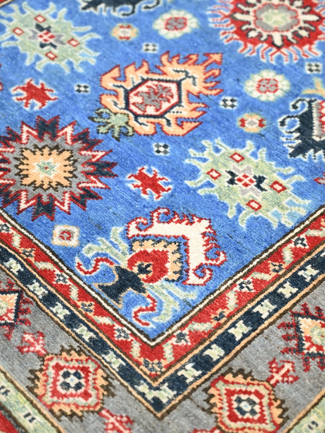 Hand-knotted Kazak Fine wool rug from Afghanistan in blue and red