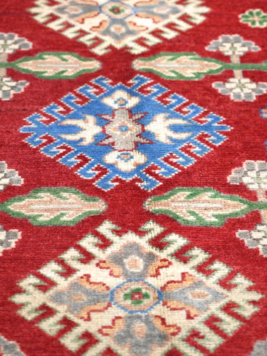 Hand-knotted Kazak Fine wool rug from Afghanistan in red and blue