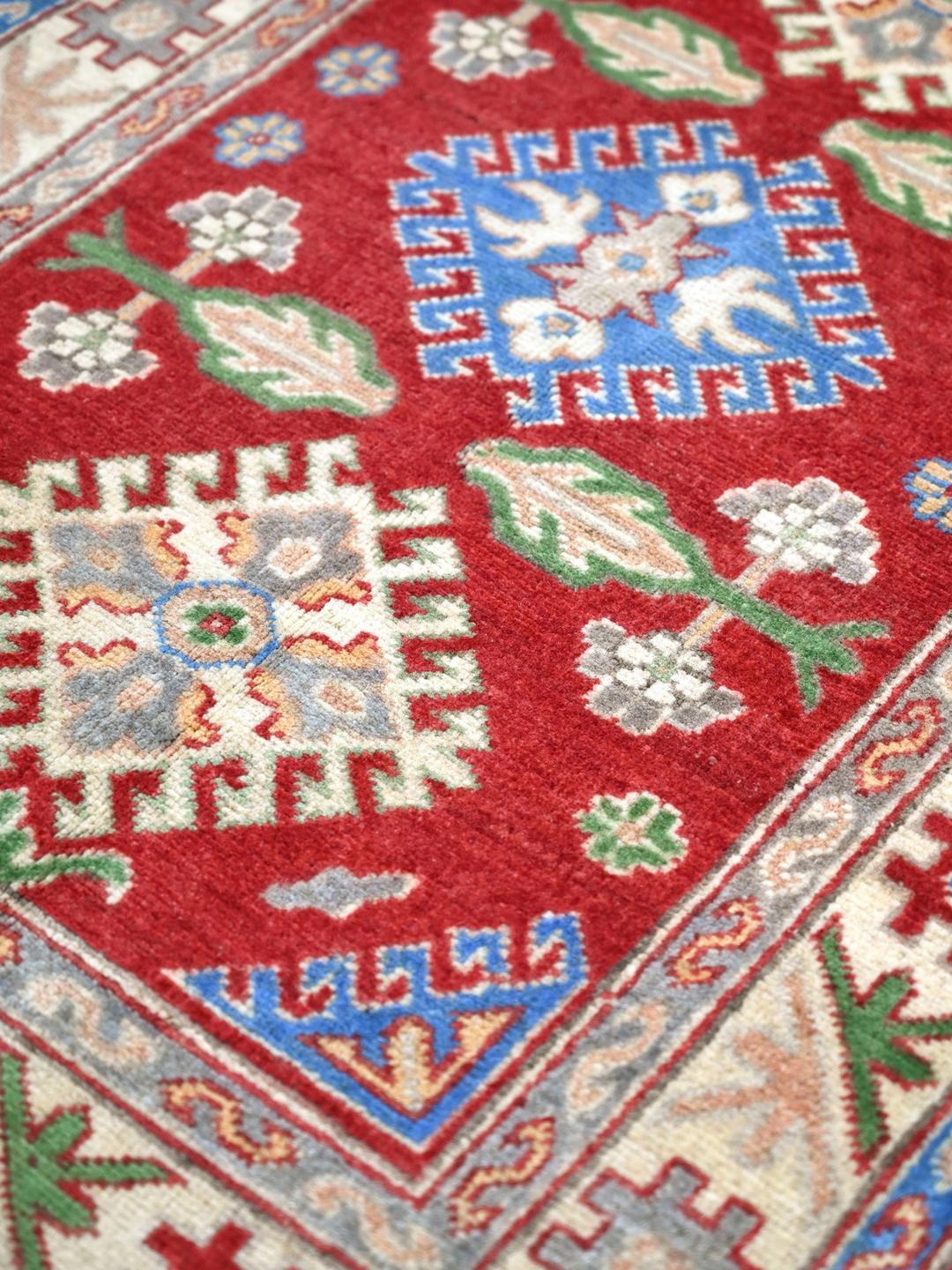 Hand-knotted Kazak Fine wool rug from Afghanistan in red and blue