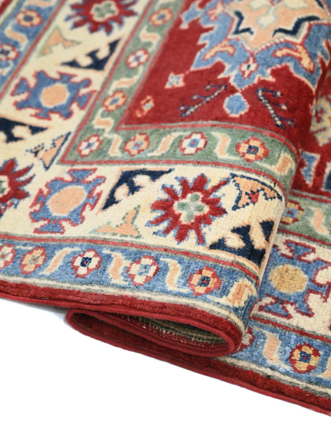 Hand-knotted Kazak Fine wool rug in red and blue from Afghanistan