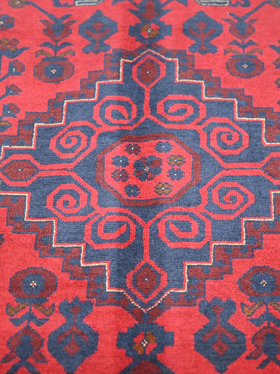 Hand-knotted Afghan Khal Mohammadi wool rug in red and dark blue