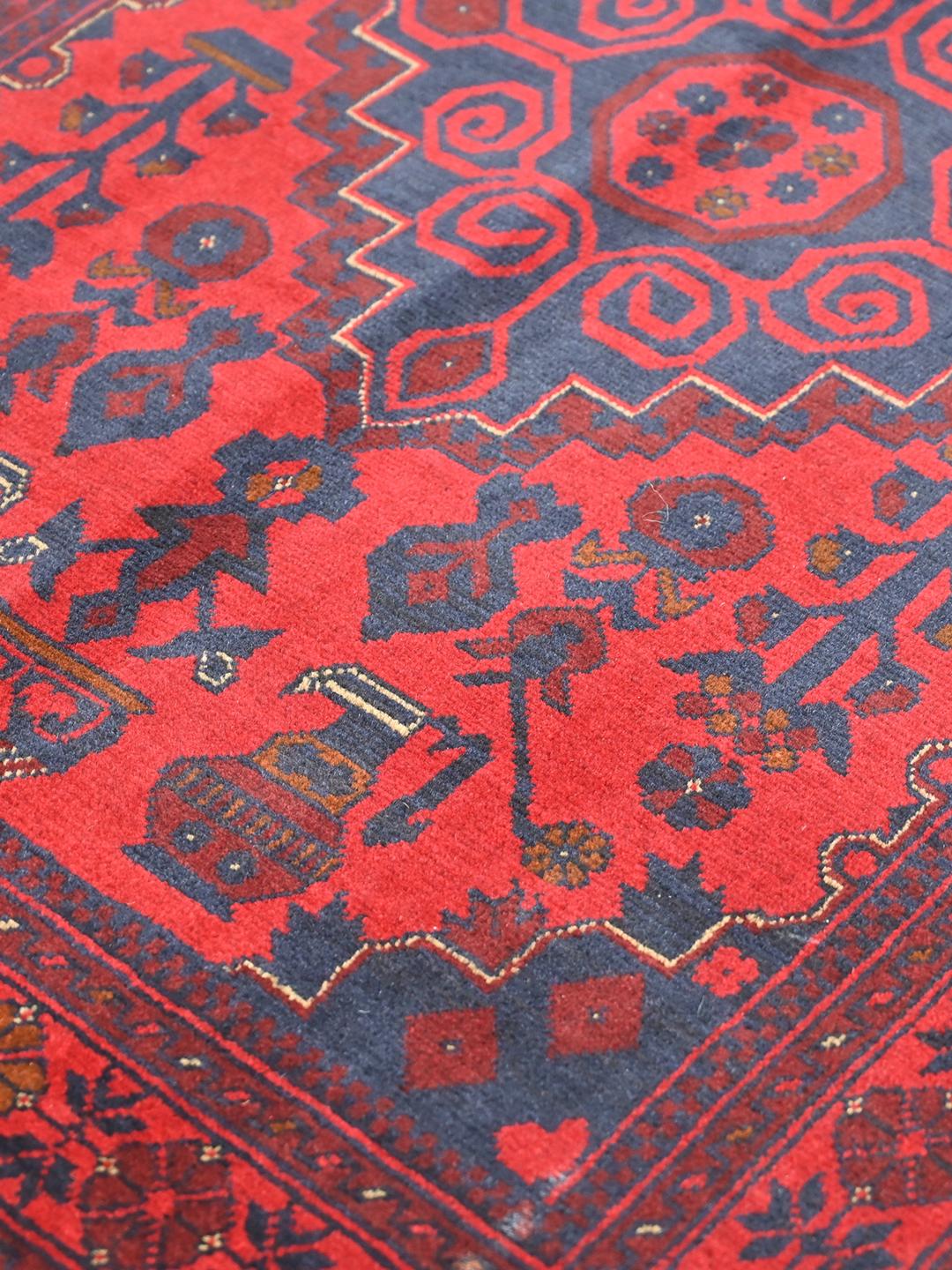 Hand-knotted Afghan Khal Mohammadi wool rug in red and dark blue