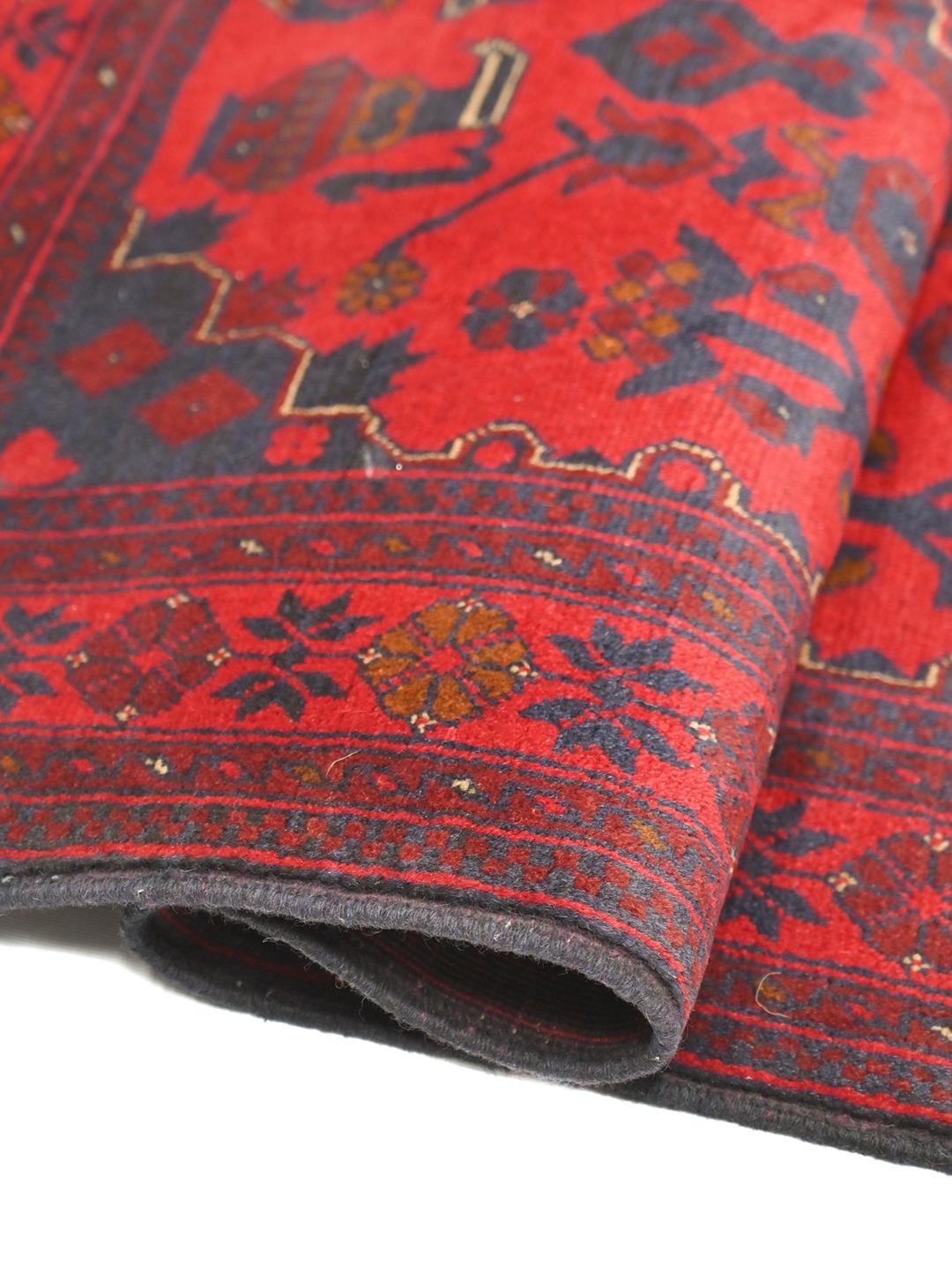 Hand-knotted Afghan Khal Mohammadi wool rug in red and dark blue