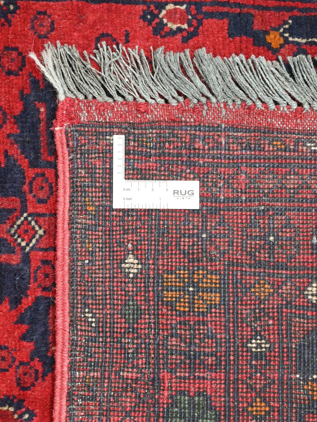 Hand-knotted Afghan Khal Mohammadi rug in red and dark-blue