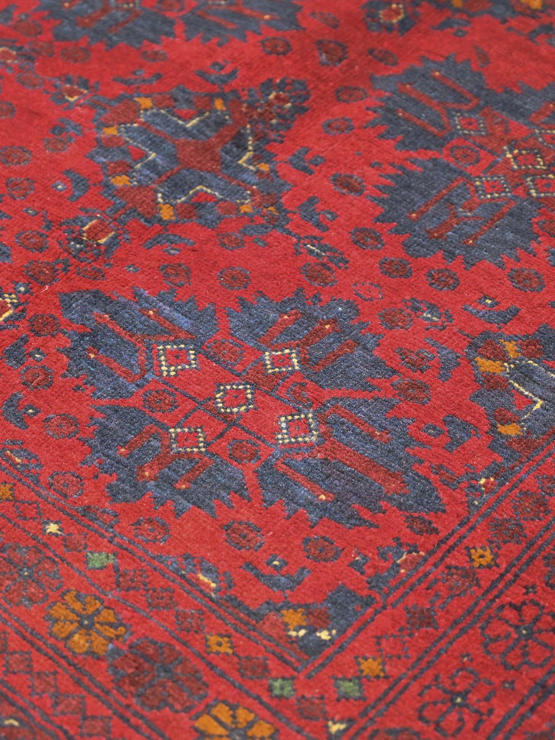 Handgeknoopt Afghaans Khal Mohammadi wollen tapijt in rood en donkerblauw