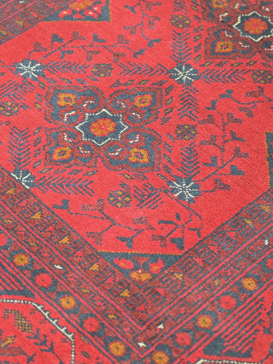 Hand-knotted Afghan Khal Mohammadi wool rug in red and black