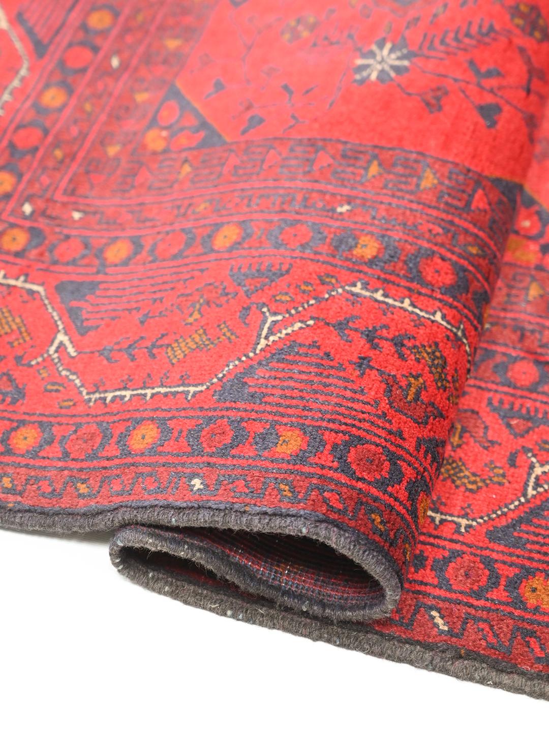Hand-knotted Afghan Khal Mohammadi wool rug in red and black