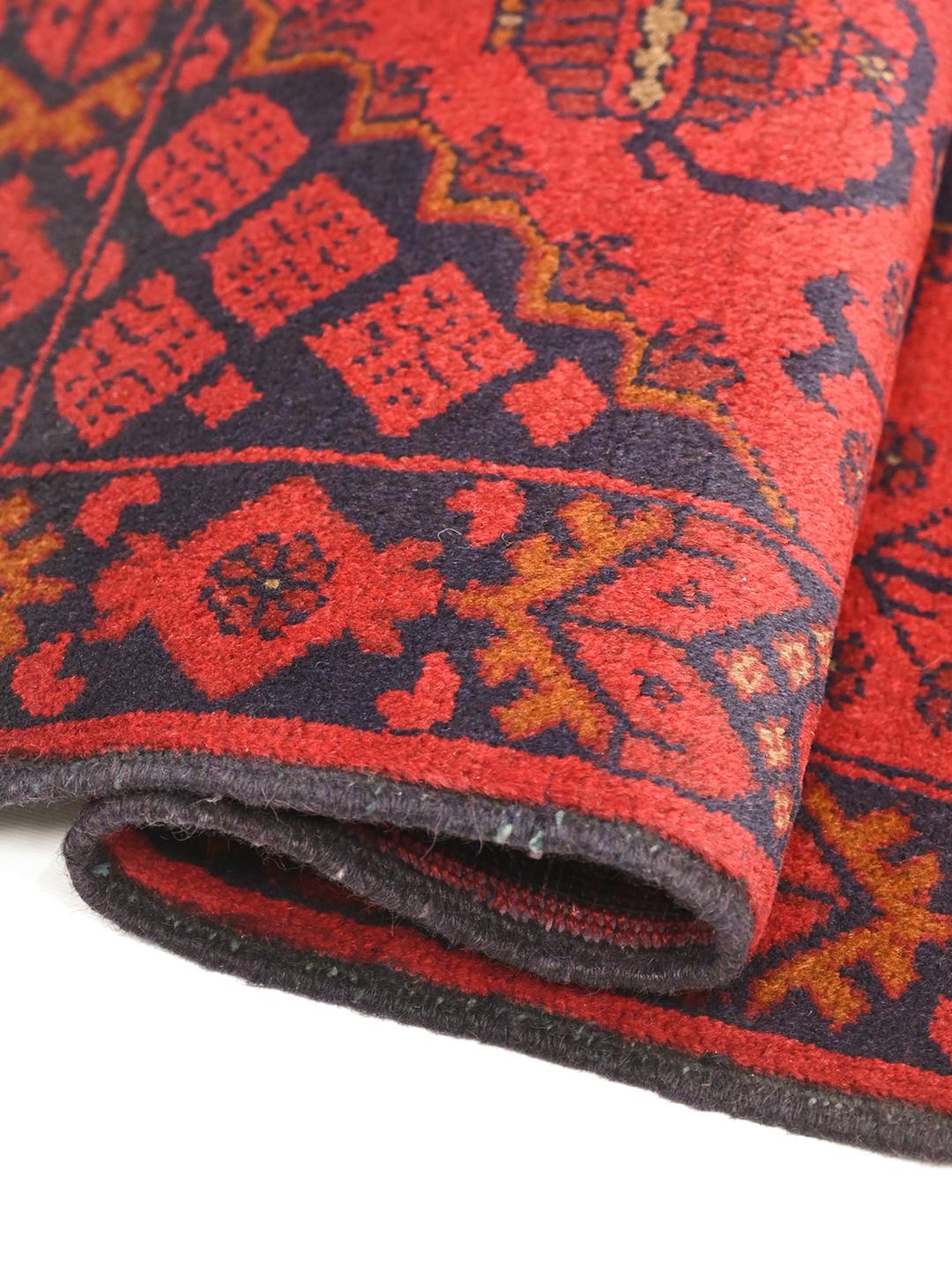 Hand-knotted Afghan Khal Mohammadi rug in red and black