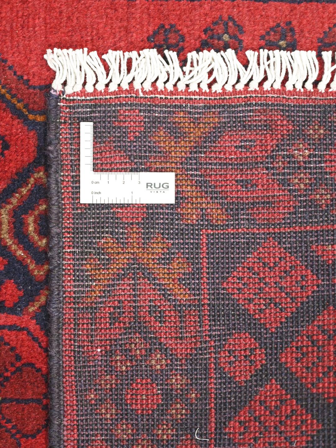 Hand-knotted Afghan Khal Mohammadi rug in red and black
