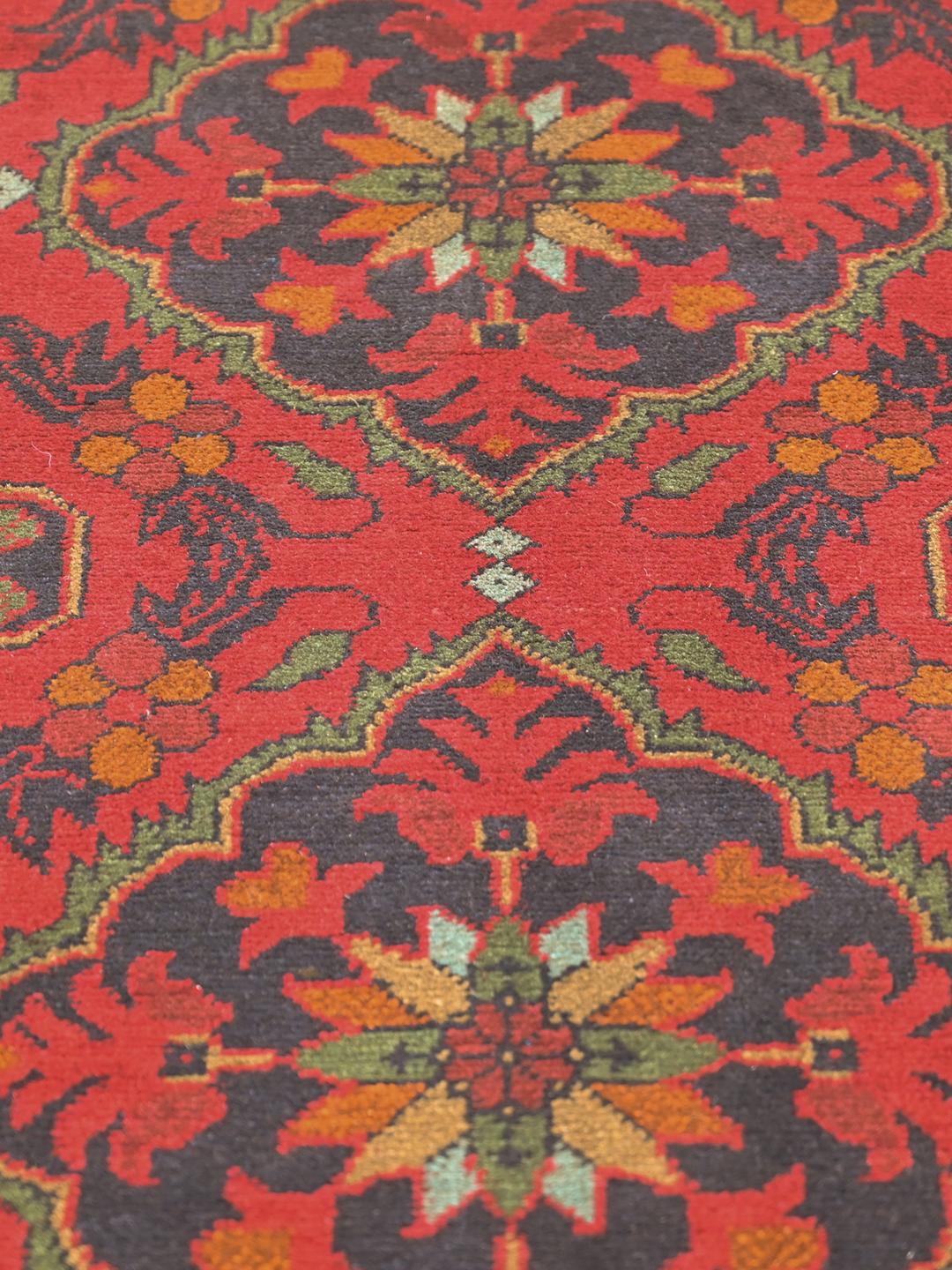 Hand-knotted Afghan Khal Mohammadi rug in red and dark blue