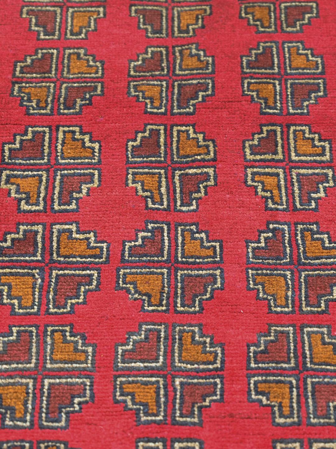 Hand-knotted Afghan Khal Mohammadi wool rug in red and dark-blue