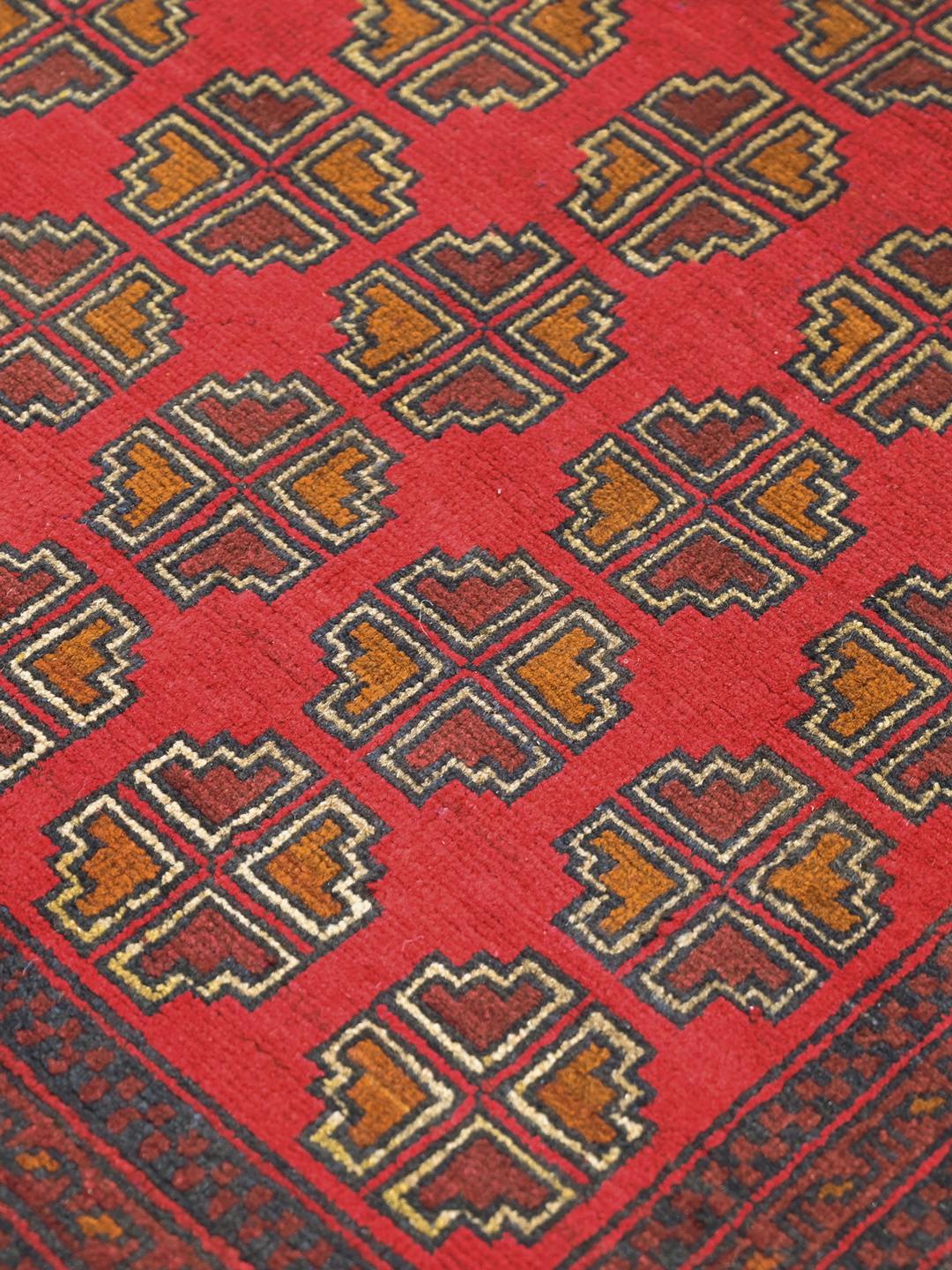 Hand-knotted Afghan Khal Mohammadi wool rug in red and dark-blue
