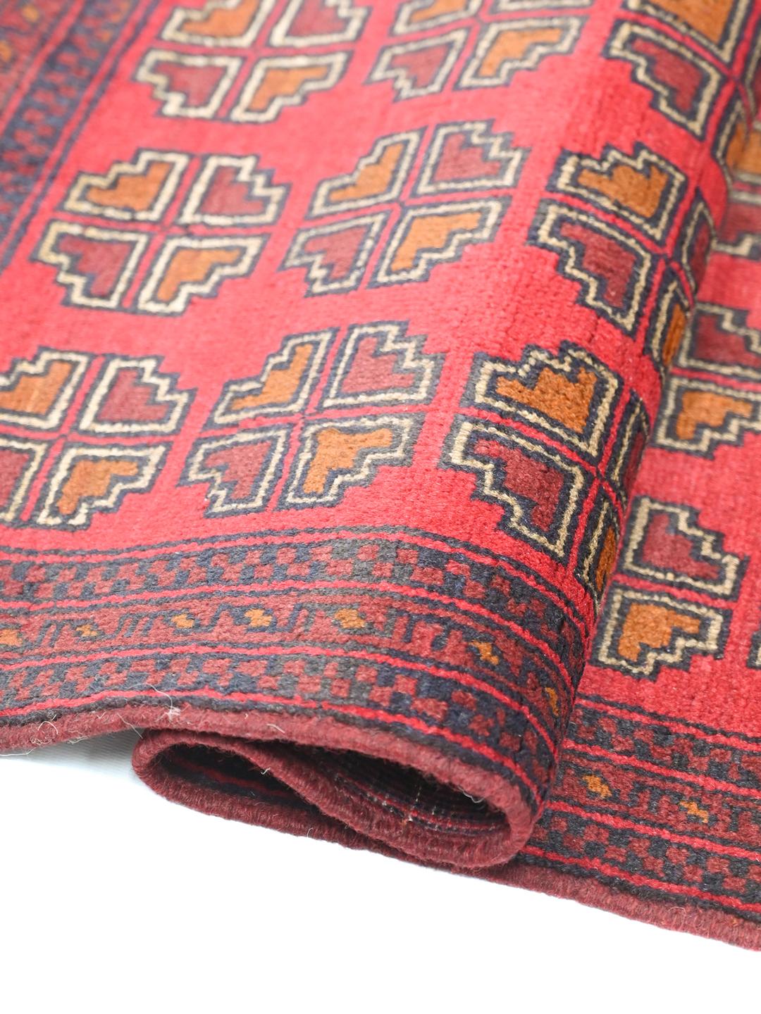 Hand-knotted Afghan Khal Mohammadi wool rug in red and dark-blue