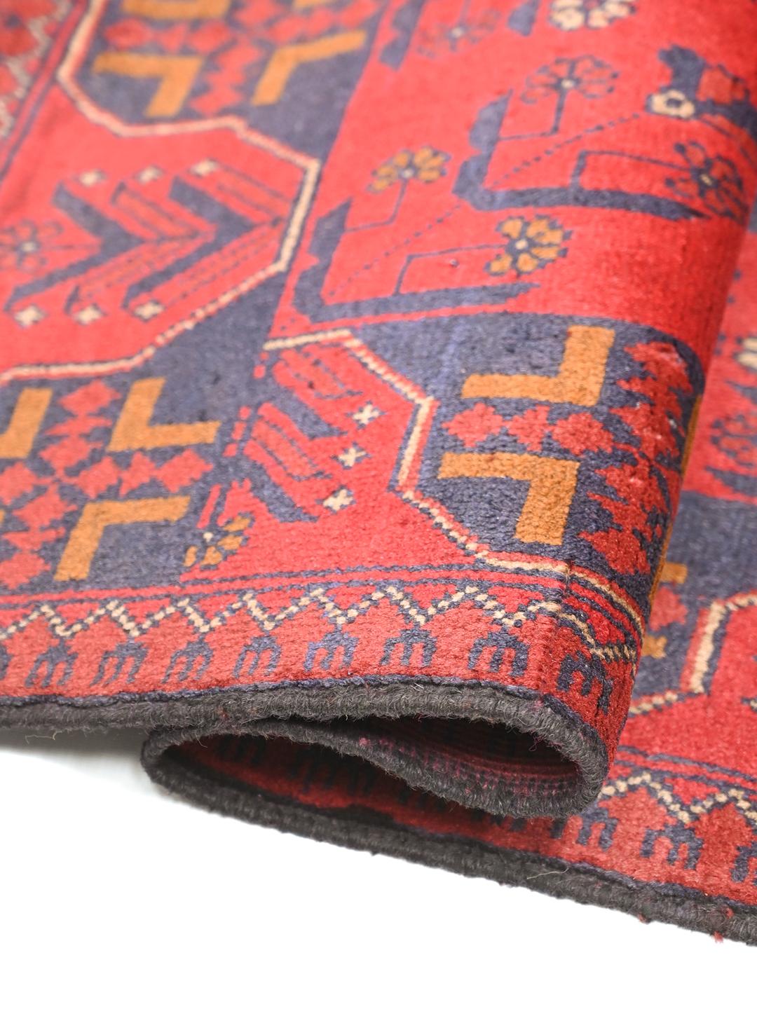 Tapis en laine rouge et bleu foncé noué à la main provenant d'Afghanistan