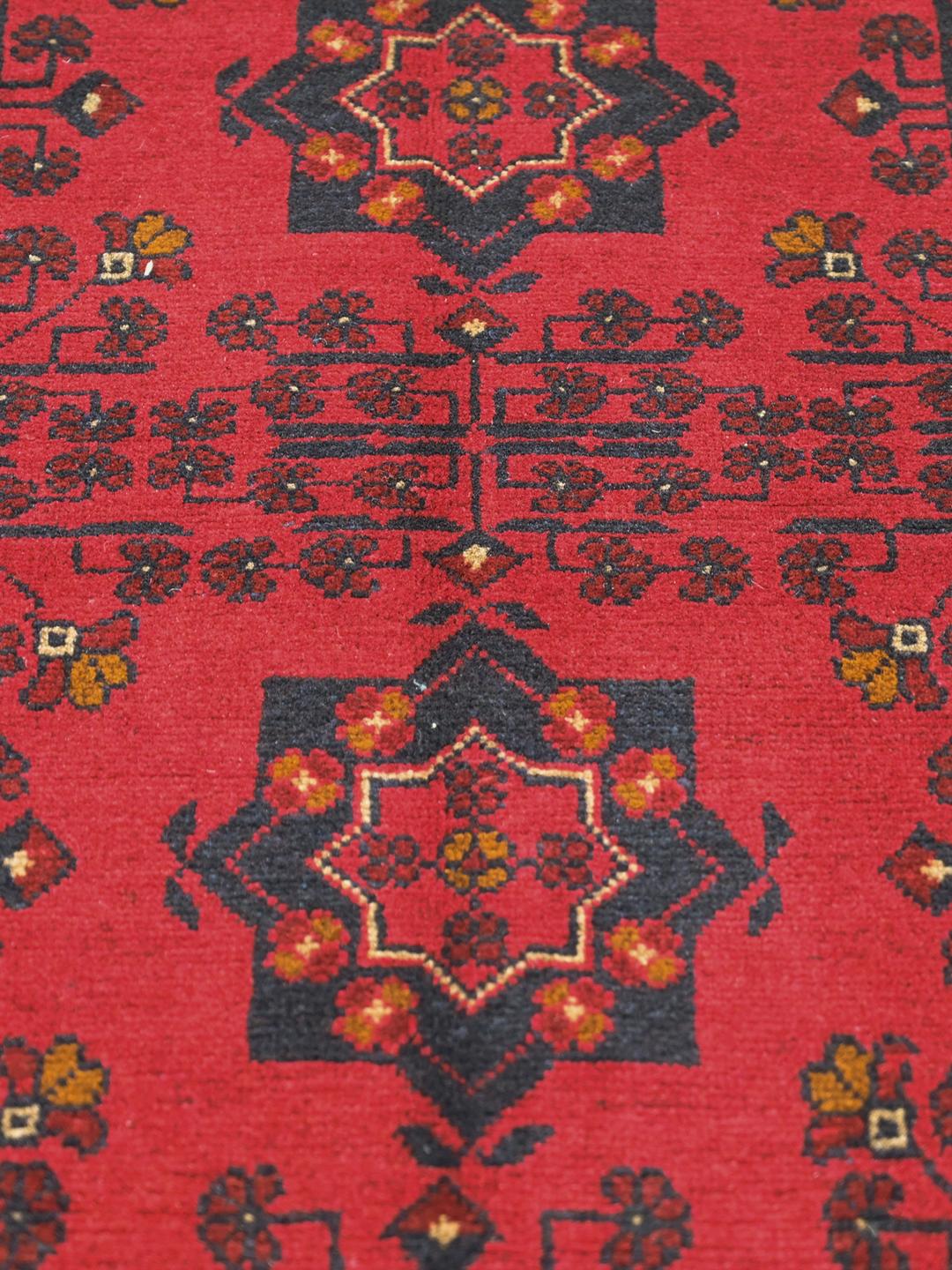 Hand-knotted Afghan Khal Mohammadi wool rug in red and dark blue