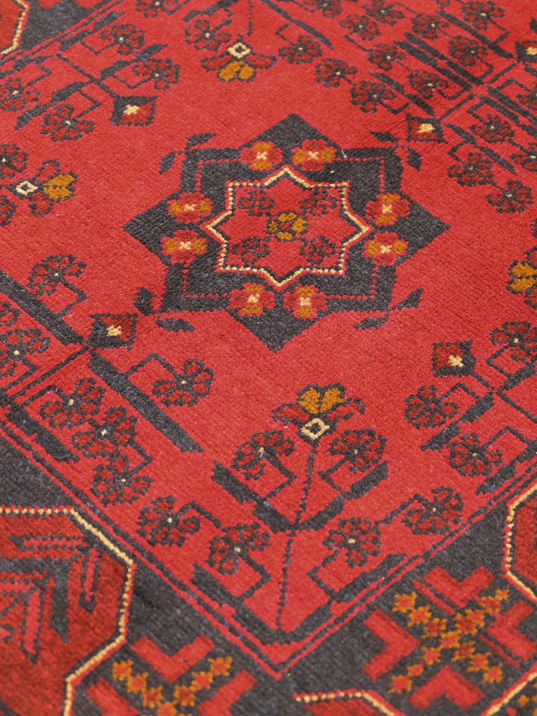 Hand-knotted Afghan Khal Mohammadi wool rug in red and dark blue