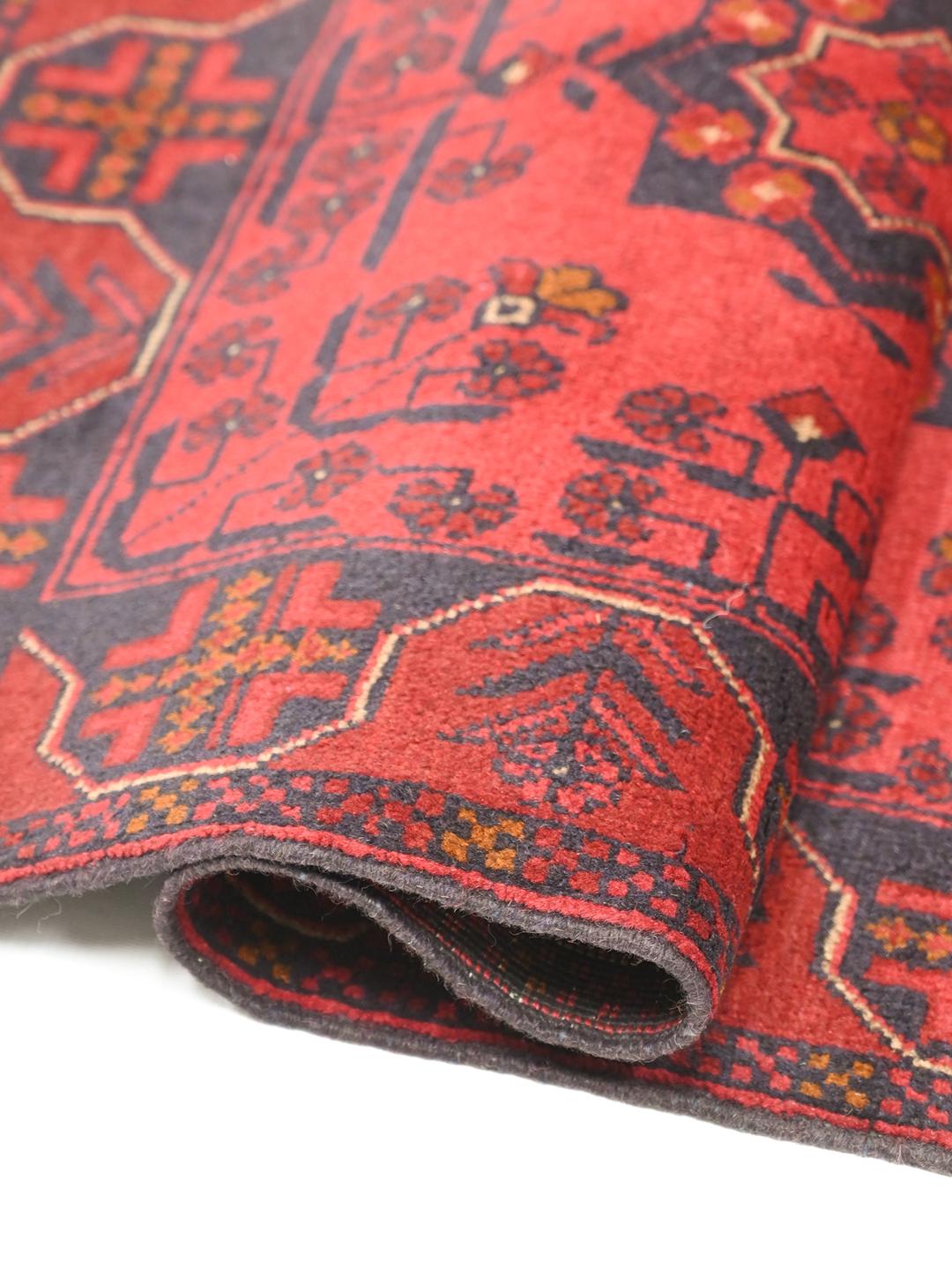 Hand-knotted Afghan Khal Mohammadi wool rug in red and dark blue