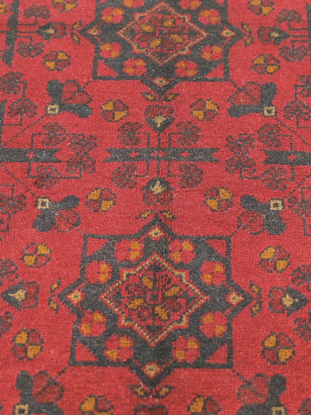 Hand-knotted red Afghan Khal Mohammadi rug with traditional medallions