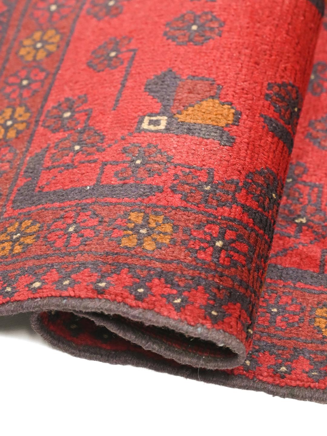 Hand-knotted red Afghan Khal Mohammadi wool rug