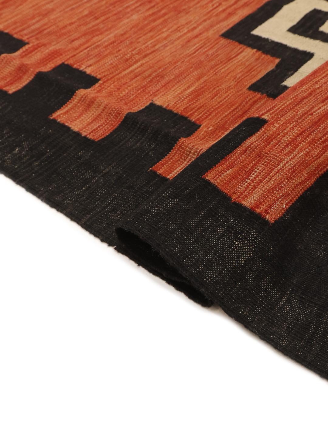 Handmade Afghan Kelim Modern rug in red and black