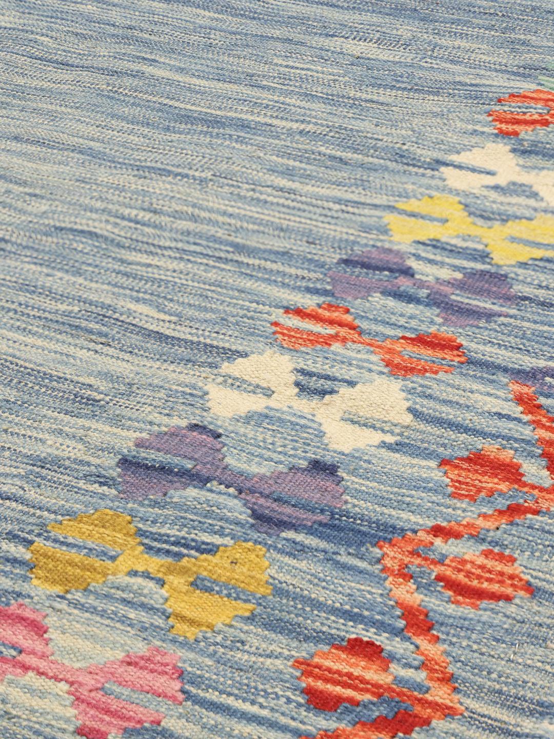 Handgeweven Afghaanse kelim in het blauw met decoratieve rand