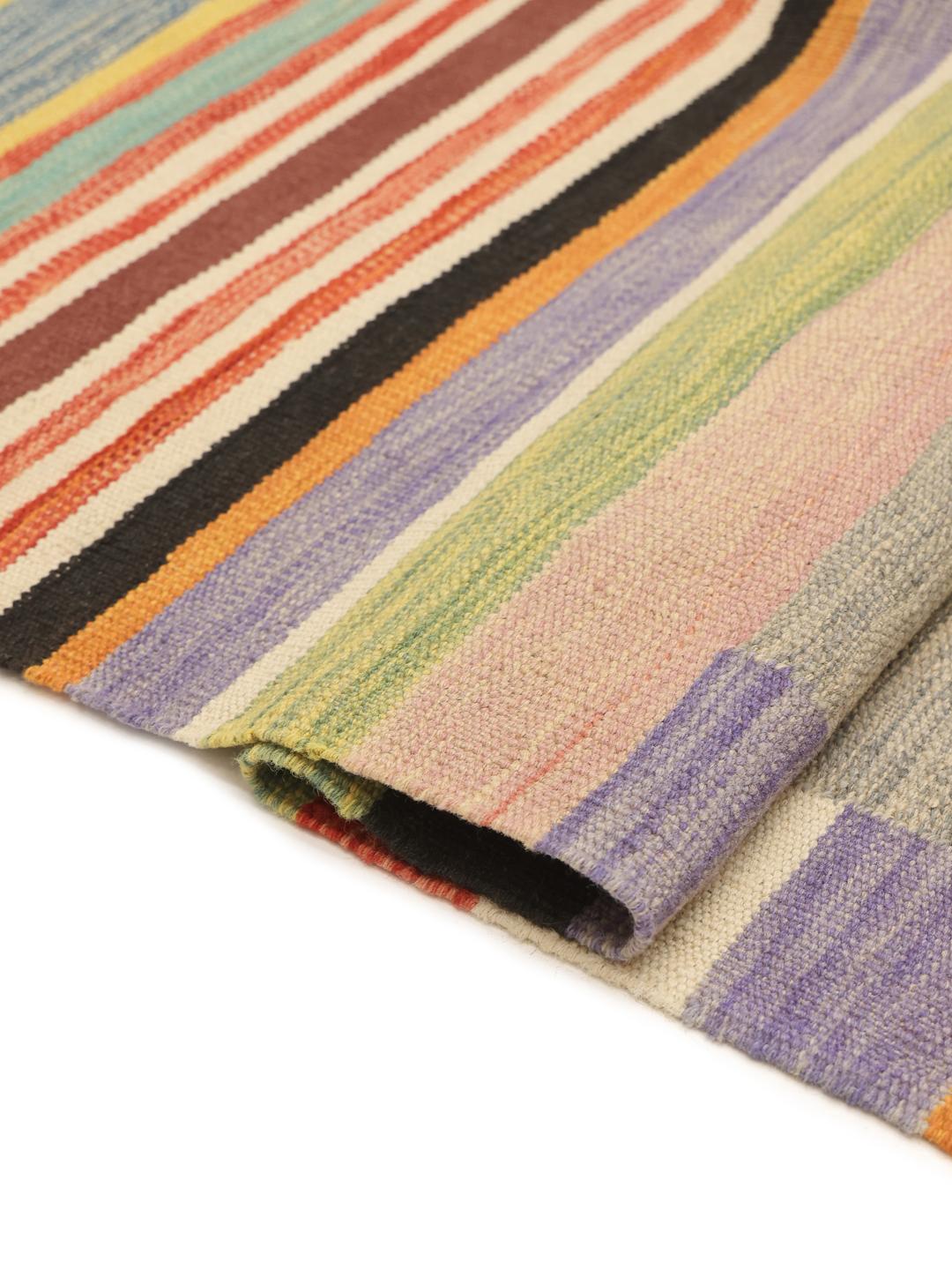 Handmade flatwoven rug from Afghanistan in multicolour with geometric pattern.