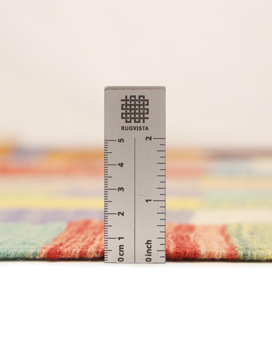 Handmade flatwoven rug from Afghanistan in multicolour with geometric pattern.