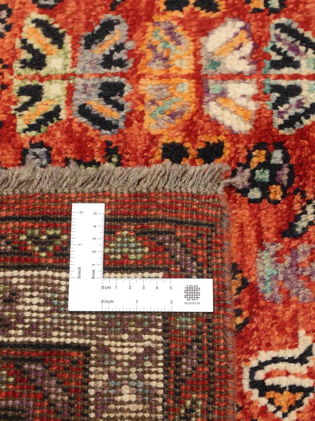 Kazak rug from Afghanistan in red
