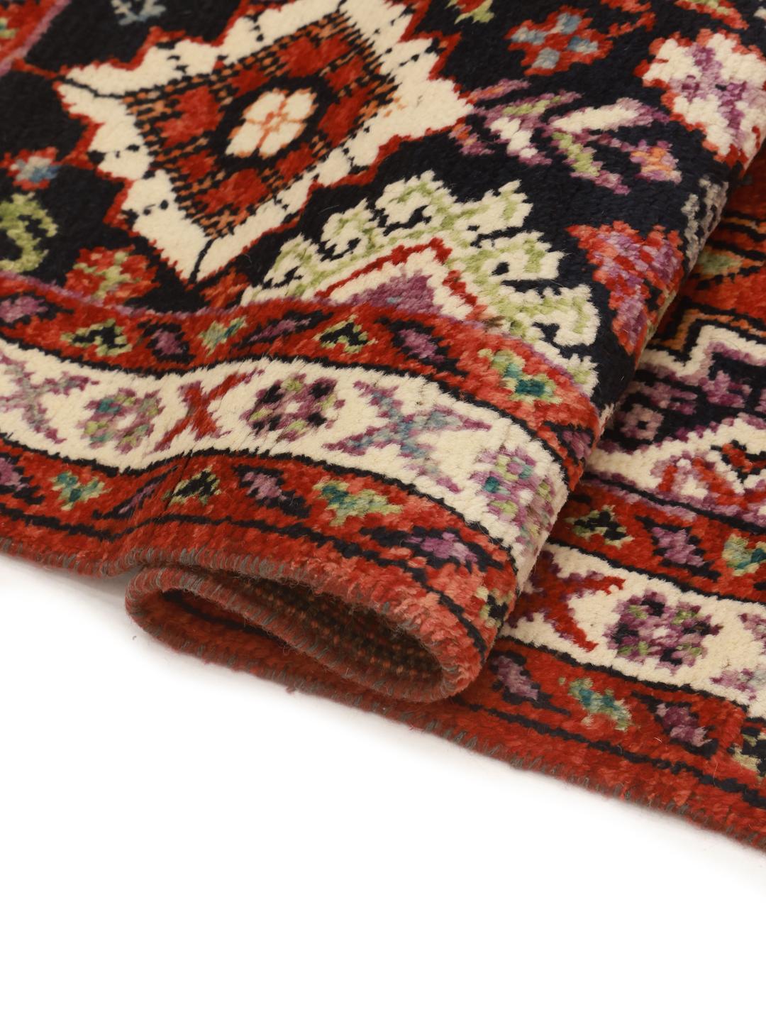 Kazak rug from Afghanistan in red and black