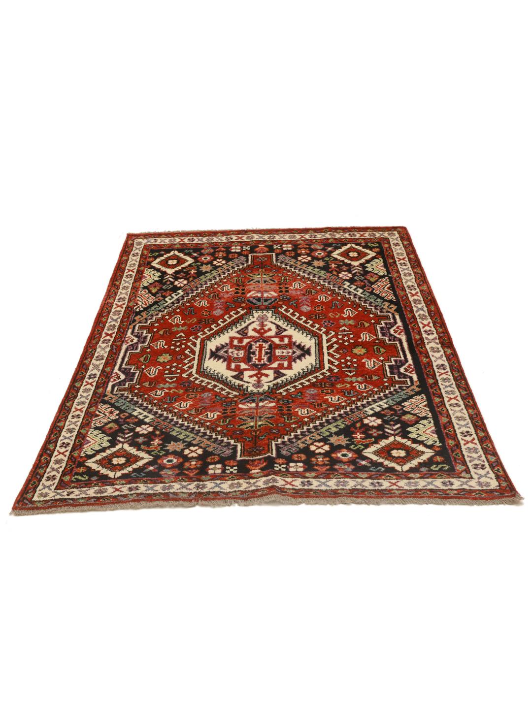 Kazak rug from Afghanistan in red and black