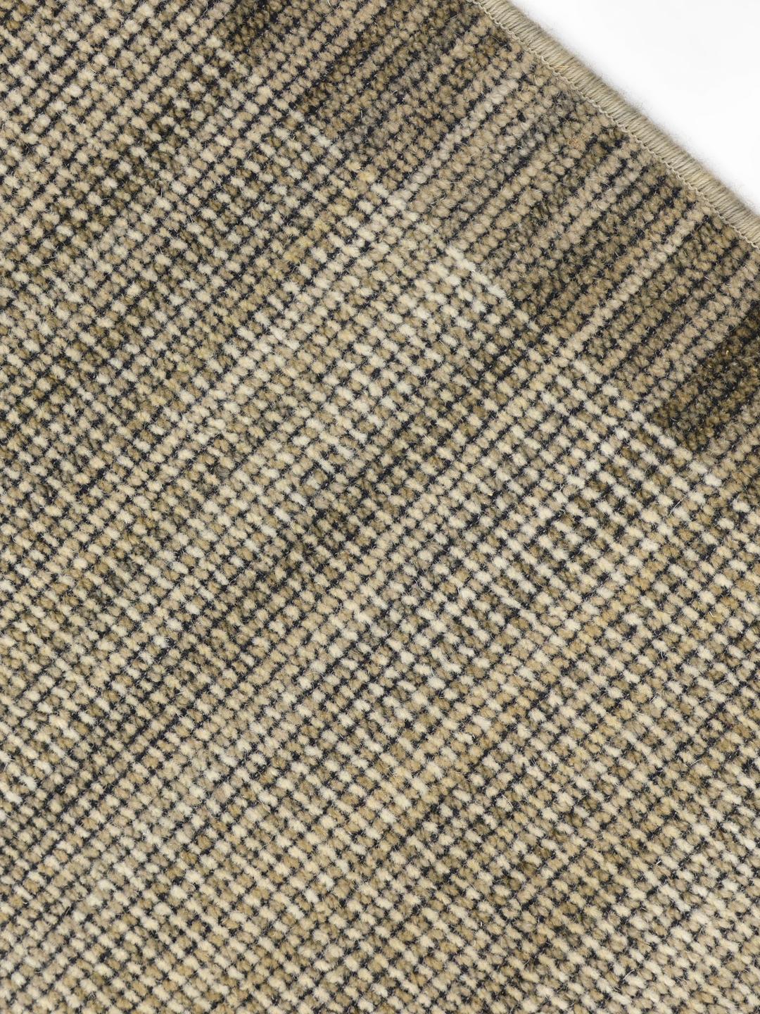 Lichtgrijs getextureerd vloerkleed met franjes