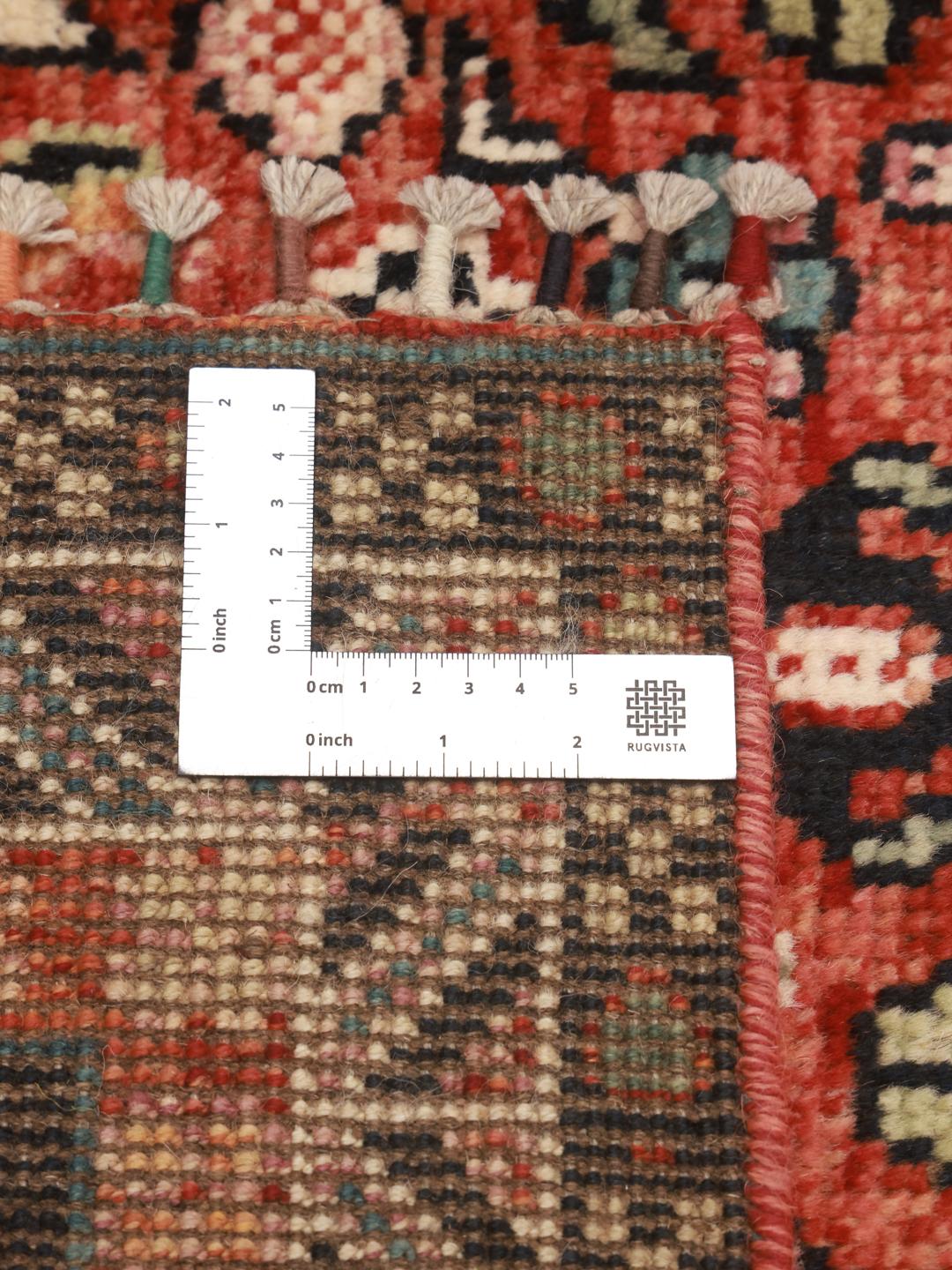 Handmade Kazak rug from Afghanistan in dark-grey and red