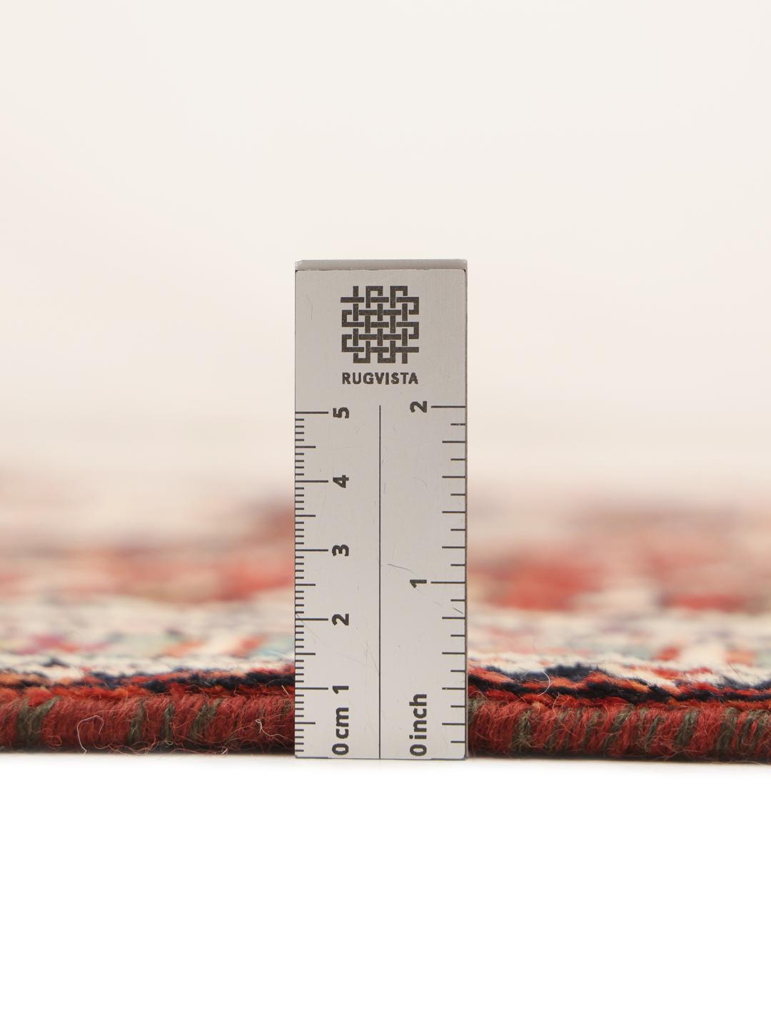 Kazak rug from Afghanistan in dark-red